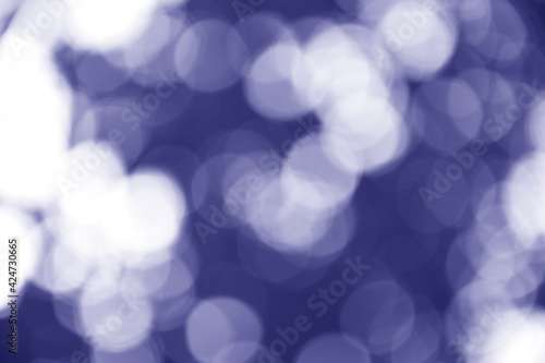 Dark bluebokeh,Dark blue background,Blurred nature bokeh for the background photo