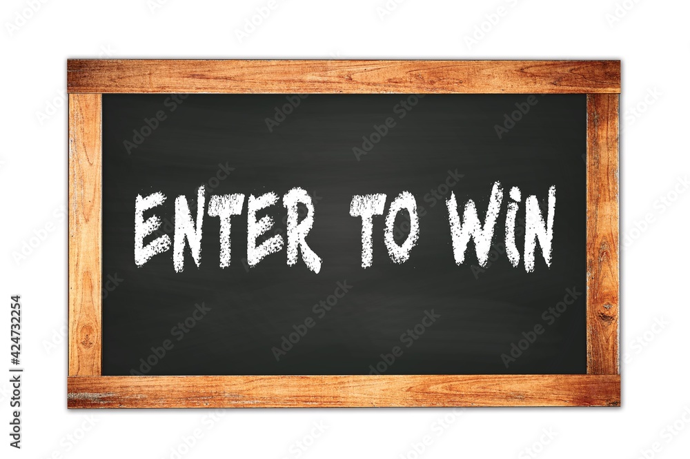 Fototapeta premium ENTER TO WIN text written on wooden frame school blackboard.