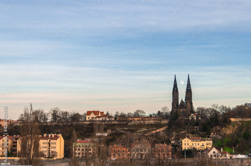 View of Vysehrad Castle and Basilica of St. Peter and Paul in Prague, Czech Republic, at sunset