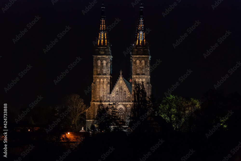 View of Vysehrad Castle and Basilica of St. Peter and Paul in Prague, Czech Republic, illuminated at night