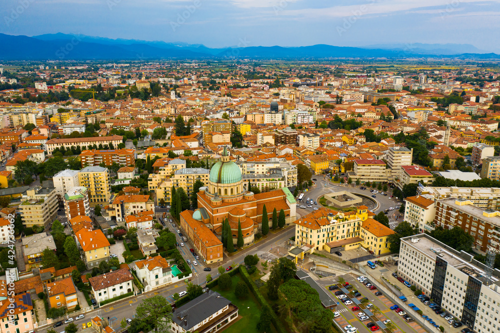 View from drone of residential areas of Italian city of Udine in sunny day