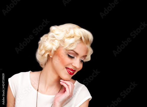 Pretty blond girl model like Marilyn Monroe in white dress with red lips photo