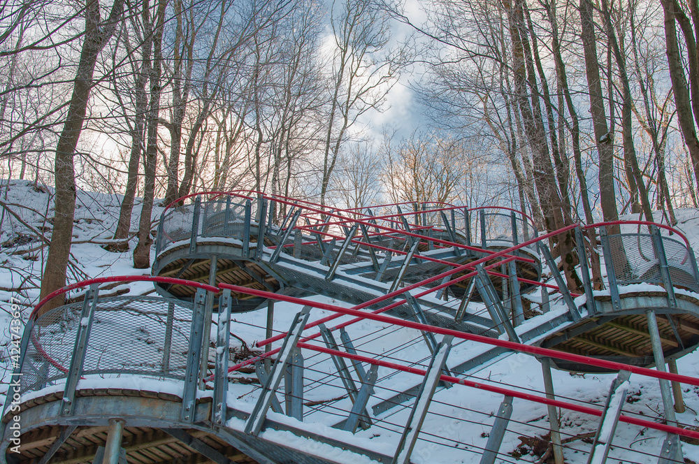 modern metal stairs covered by snow modern metal stairs covered by snow