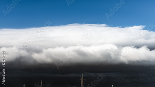 Photography Sky with clouds and a dark thundercloud is approaching storm
