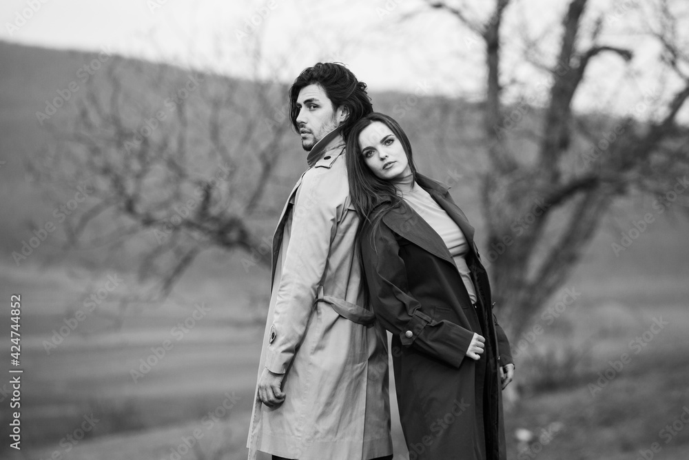 Beautiful sensual portrait of young stylish couple in love.Image of adorable brunette couple in love. Happy family. Beautiful sensual portrait of young stylish couple in love.Image of adorable brunette couple in love. Happy family.