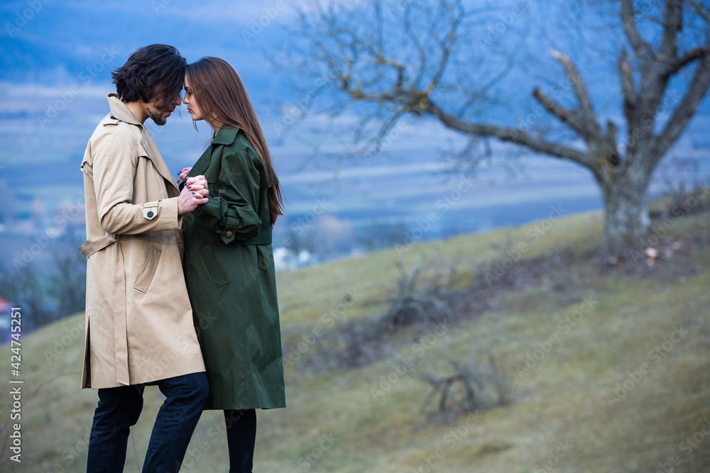 Beautiful sensual portrait of young stylish couple in love.Image of adorable brunette couple in love. Happy family. Beautiful sensual portrait of young stylish couple in love.Image of adorable brunette couple in love. Happy family.