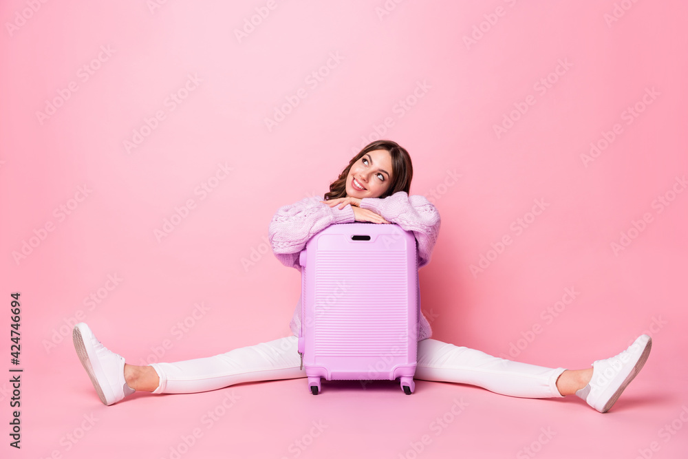 Full length portrait of cheerful lady put hands on bag look interested empty space isolated on pink color background Full length portrait of cheerful lady put hands on bag look interested empty space isolated on pink color background