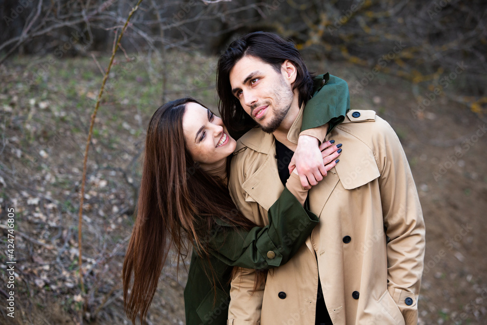 Beautiful sensual portrait of young stylish couple in love. Image of adorable brunette couple in love. Happy family. Beautiful sensual portrait of young stylish couple in love. Image of adorable brunette couple in love. Happy family.