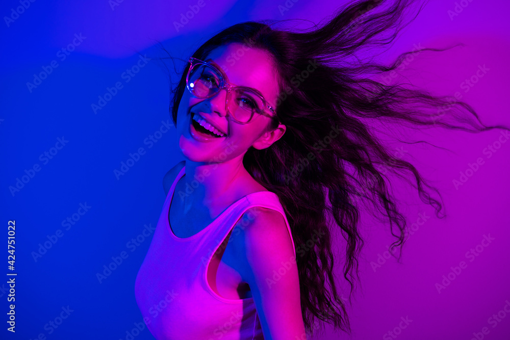 Profile portrait of pretty positive person have fun chilling toothy smile isolated on neon background Profile portrait of pretty positive person have fun chilling toothy smile isolated on neon background