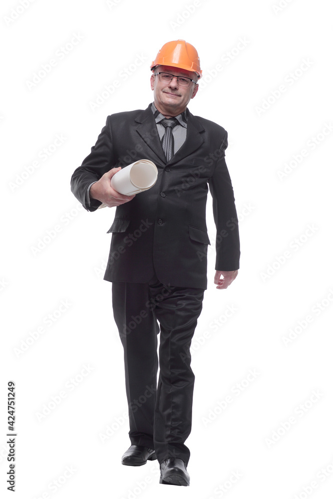 Businessman in wearing hard hat holding documents Businessman in wearing hard hat holding documents
