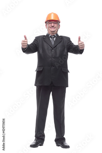 Architect man wearing suit and helmet over isolated white background