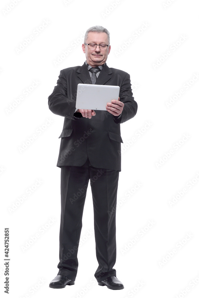 Senior man in suit and with glasses using tablet computer Senior man in suit and with glasses using tablet computer