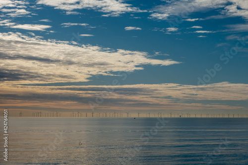 Rampion Wind Farm on the horizon visible from the beach at Brighton.