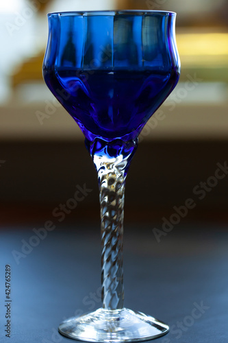 blue vintage wine glass close-up. antique wine glass