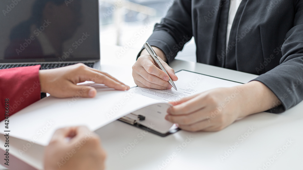 Sign a document, Signing of employment contract documents, Applicants are legally selected to work in the company, Employment and selection of new staff representatives concept. Sign a document, Signing of employment contract documents, Applicants are legally selected to work in the company, Employment and selection of new staff representatives concept.