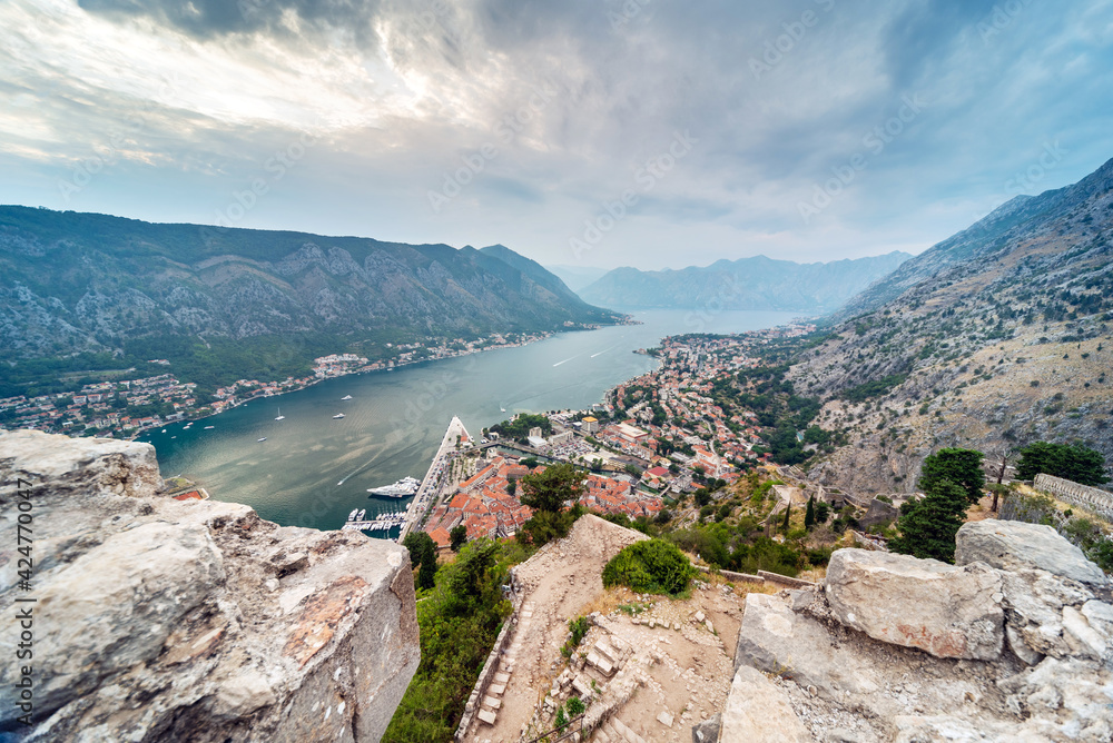 Kotor Bay towards the sunset from St John's Fortress,overlooking Old Town below, Montenegro,Eastern Europe.