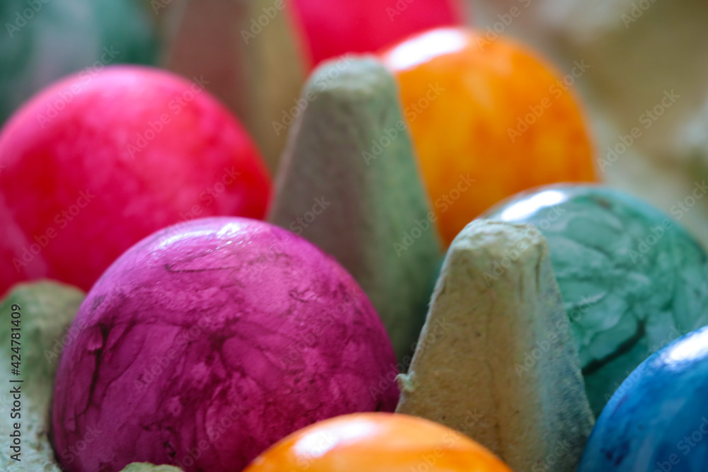 Easter colored eggs in a cardboard box. Easter colored eggs in a cardboard box.