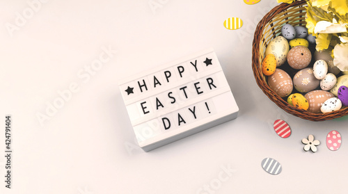 Happy Easter flat lay background with text, easter eggs, banner on white background