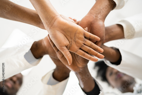 African American Medical Team Hands Stack