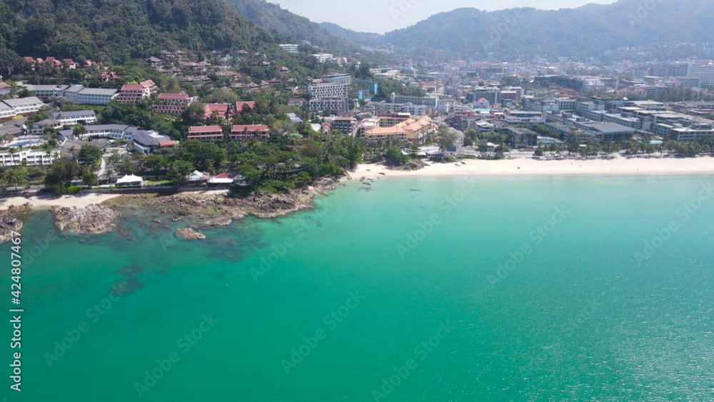 Phuket Thailand After Covid-19. Aerial view in drone shot perspective. Beach sea and city at beach. Patong Beach Thailand. Nature and travel concept. Phuket Thailand After Covid-19. Aerial view in drone shot perspective. Beach sea and city at beach. Patong Beach Thailand. Nature and travel concept.