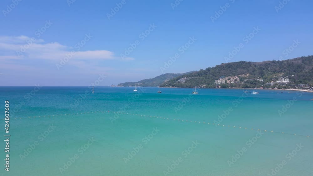 Phuket Thailand After Covid-19. Aerial view in drone shot perspective. Beach sea and city at beach. Patong Beach Thailand. Nature and travel concept. Phuket Thailand After Covid-19. Aerial view in drone shot perspective. Beach sea and city at beach. Patong Beach Thailand. Nature and travel concept.
