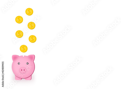 Golden coin dropping in pink piggy bank for save money concept on white background.