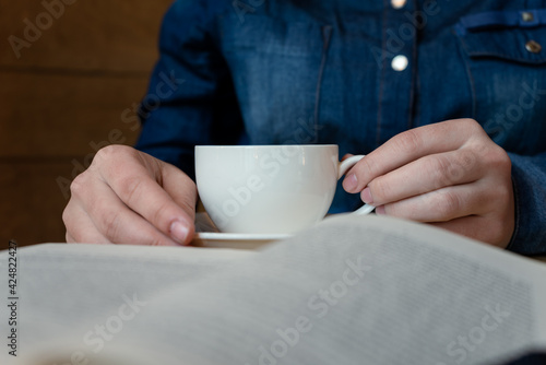 girl drinking green tea in a cafe