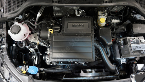 Modern engine. Top view. On the intake manifold there is the MPI lettering. Selected focus.