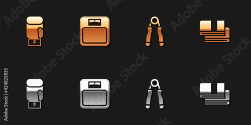 Set Boxing glove, Bathroom scales, Sport expander and Towel stack icon. Vector