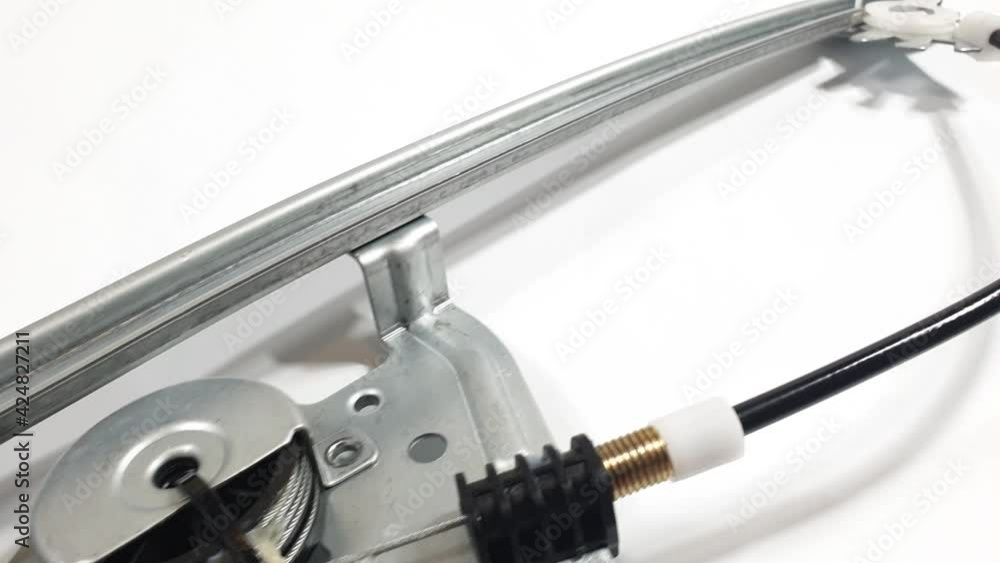 car spare parts, car window lifter, iron and plastic parts on white background car spare parts, car window lifter, iron and plastic parts on white background