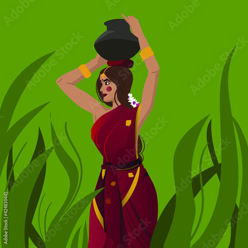 Fotografia beautiful Indian village woman is carrying water pot on her head