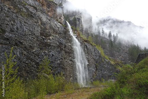 Beautiful roadside waterfall located along the North Cascades Scenic Highway, Washington State Route 20, in the Northern Cascades National Park.