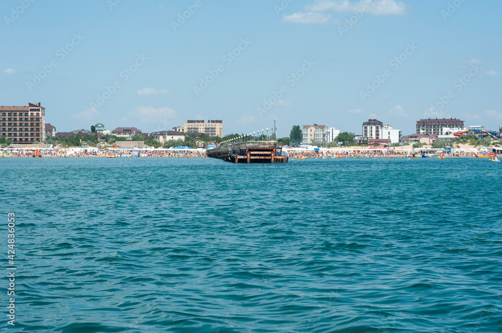 View from the boat to the southern resorts and hotels of the Black Sea coast. Coastal resort area, sea holidays. High quality photo