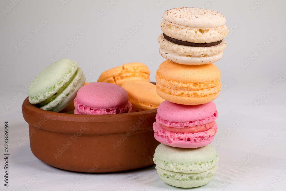 Fototapeta premium Colorful and tasty Macaron cakes. Small French cakes. Background