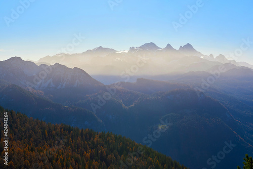 Beautiful Foggy Landscape in Austrian Alps with top mountains.