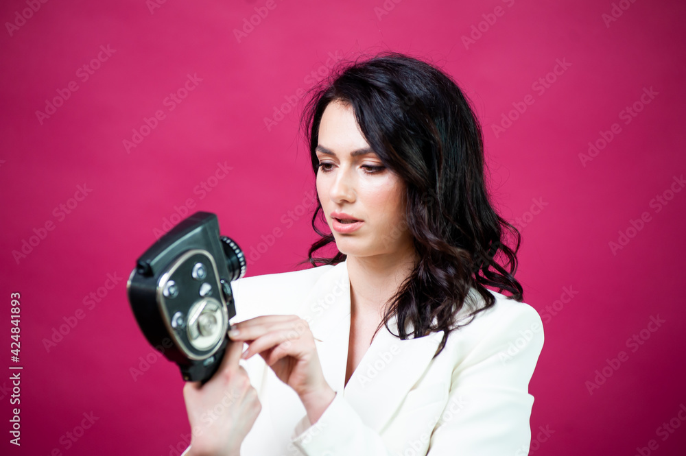 Fototapeta premium Beautiful woman with photo camera