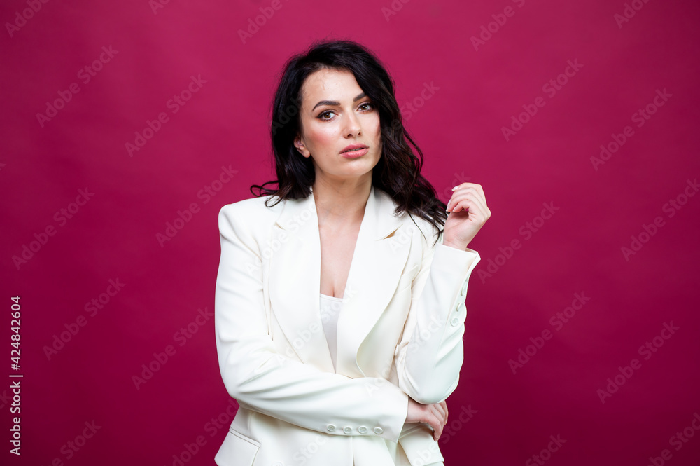 Beautiful young woman in a white suit
Beautiful young woman in a white suit