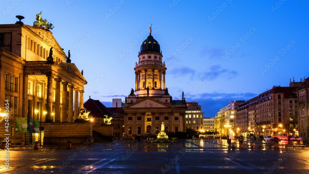 Berlin, Germany. Evening view of Konzerthaus and Französischer Dom at Gendarmenmarkt in Berlin, Germany. Time-lapse at sunset with moving cars and people Berlin, Germany. Evening view of Konzerthaus and Französischer Dom at Gendarmenmarkt in Berlin, Germany. Time-lapse at sunset with moving cars and people