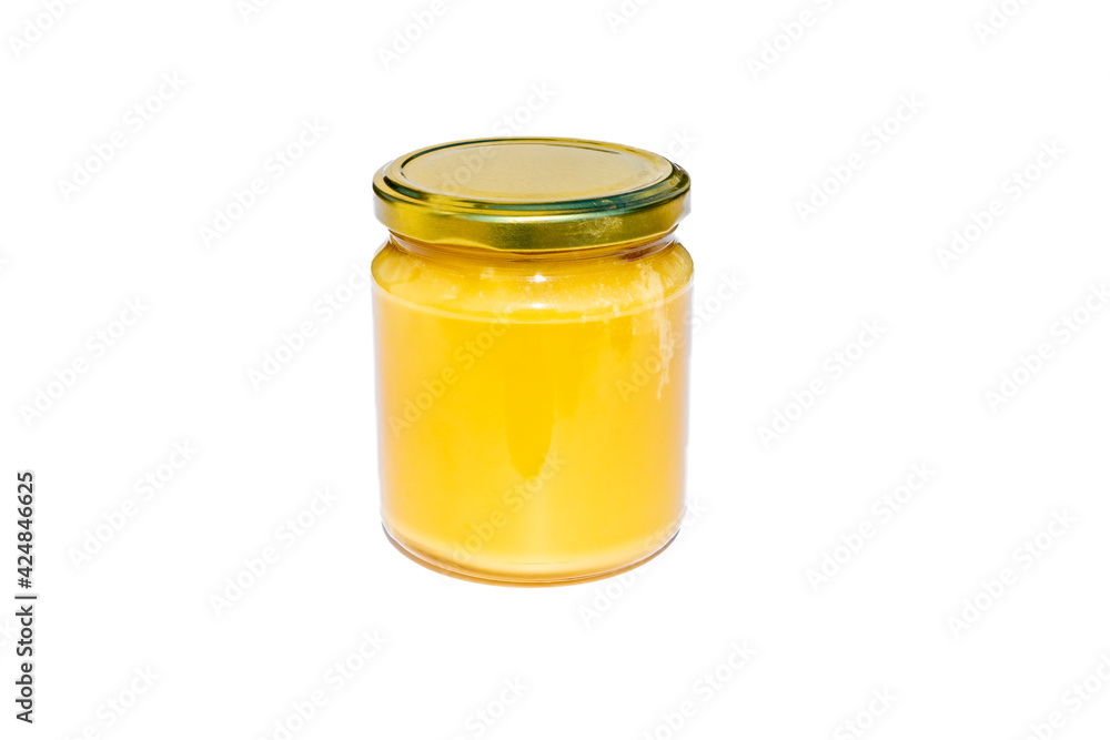 Honey in jar isolated on white background Honey in jar isolated on white background