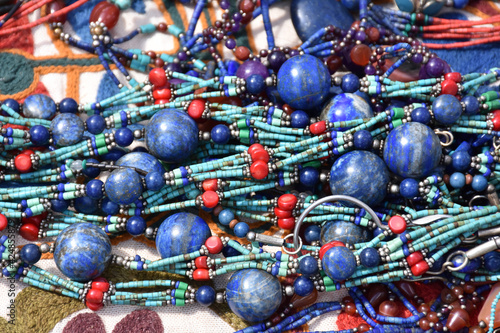 Traditional Turkish accessories are displayed on a market stand .ballbearing, authentic jewelery