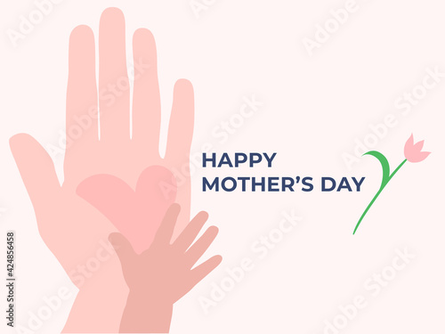 card for mother's day. mother's hand and children's palm are holding a heart. english text.