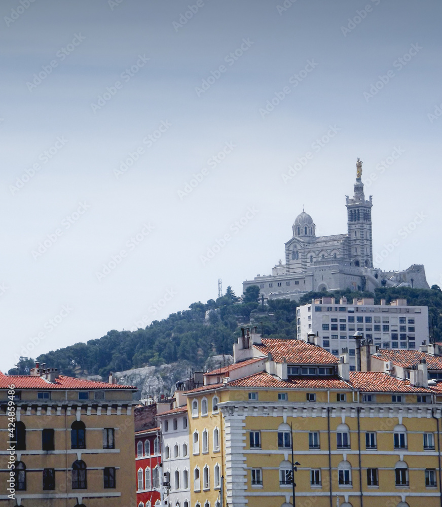 City view including basilica on hill in Marseille France
