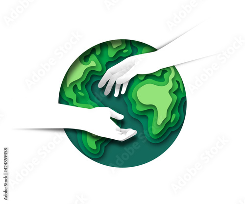 Two hands helping together paper cut earth