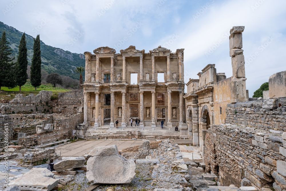 wide angle view of famous Celsus Library third largest library in the ancient world in Ephesus ruins, historical ancient Roman archaeological sites in eastern Mediterranean Ionia region, Selcuk, Izmir