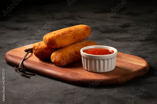 Fried risoles or Risol. Risoles stuffed with cheese and ham. photo