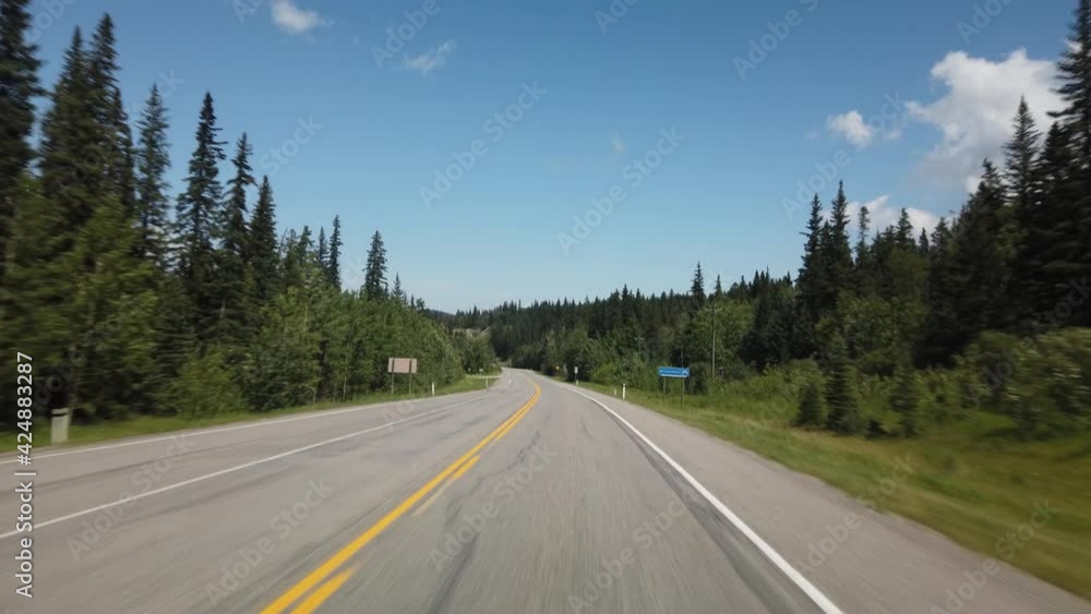 Smooth Drive in Nature Through Kananaskis During Sunny Day Towards Banff Smooth Drive in Nature Through Kananaskis During Sunny Day Towards Banff