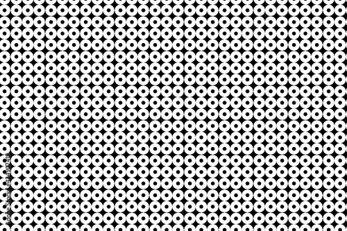 Patrón de aros blancos sobre fondo negro