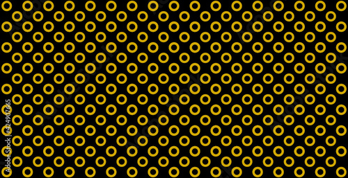 Patrón de anillos dorados sobre fondo negro