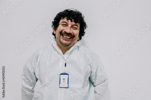 portrait of a doctor smiling , white background 