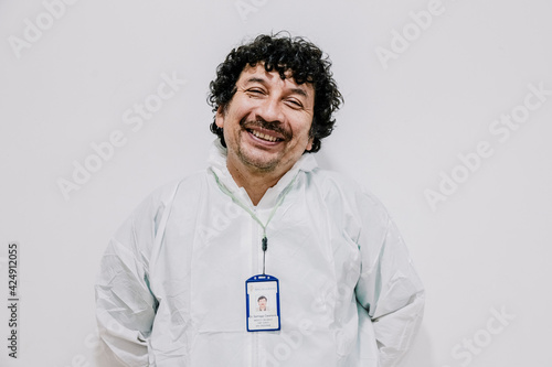 portrait of a doctor smiling , white background 